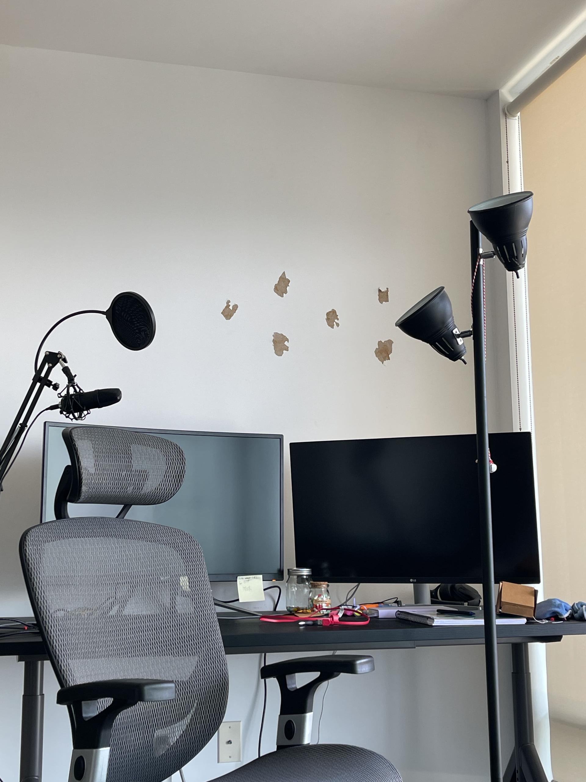 Drywall before repair — visible hole and damage