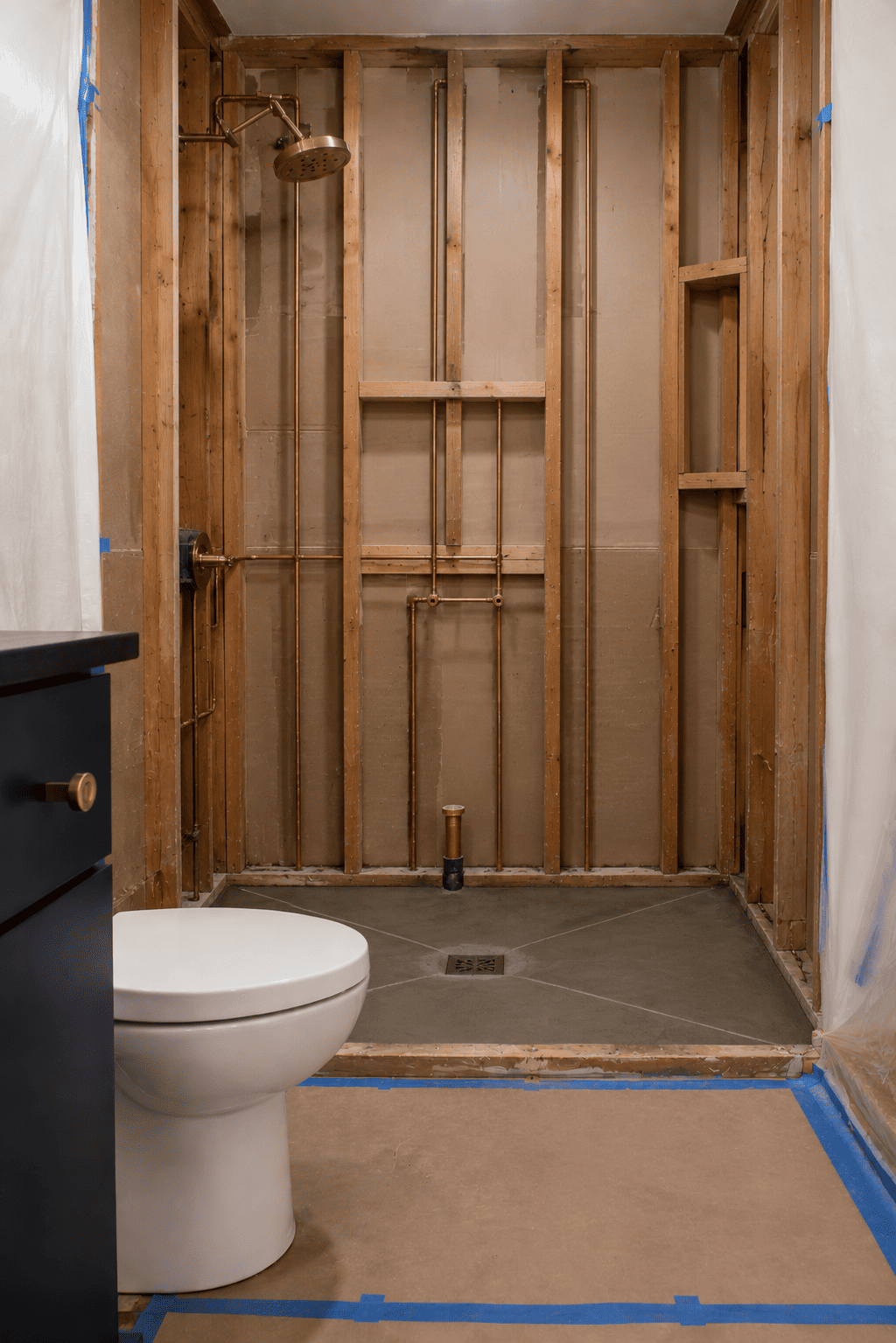 Plumbing rough-in for a tub-to-shower conversion in Toronto