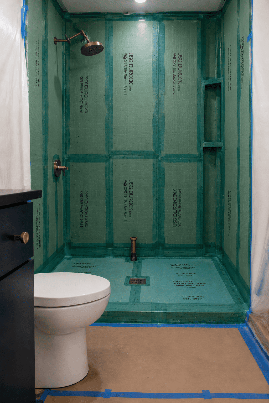 Shower waterproofing membrane installation β flood-tested before tiling